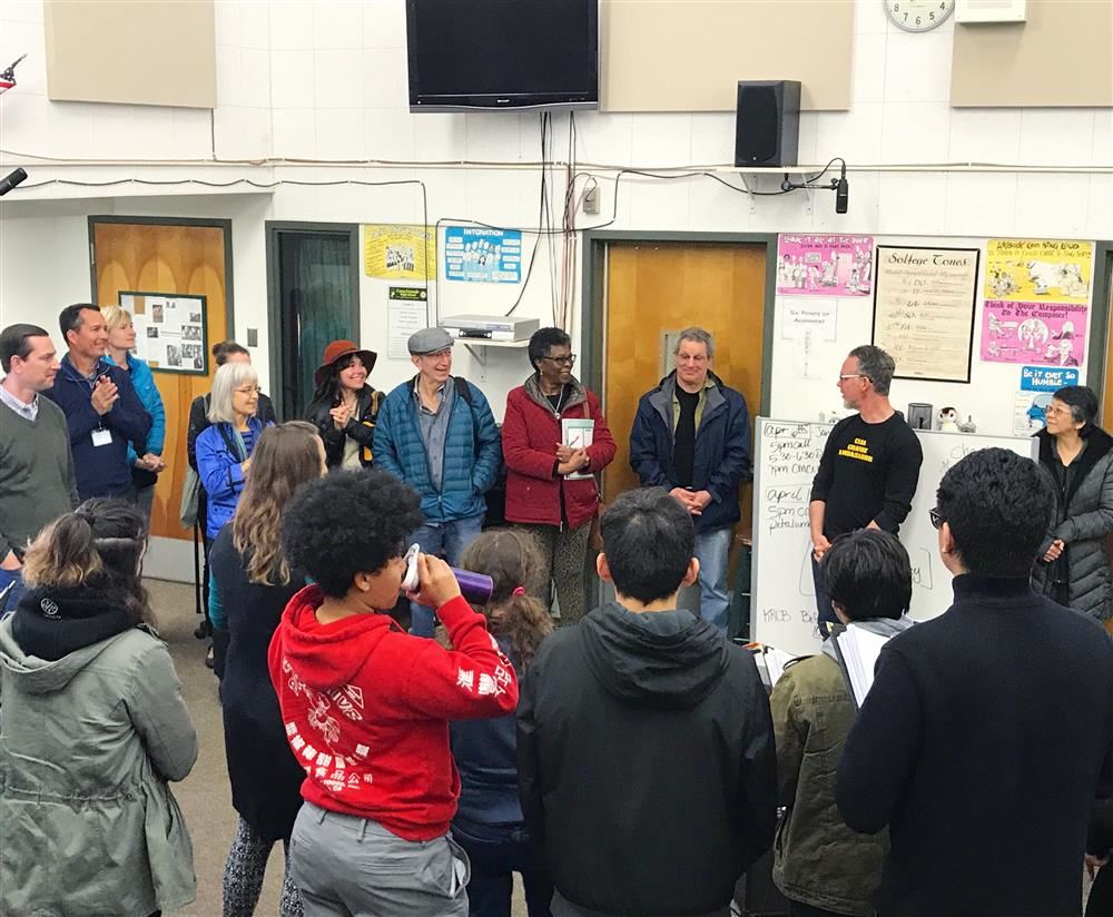 Group on tour of Casa and discussing diversity, anti-bias, and inclusiveness at PCS 