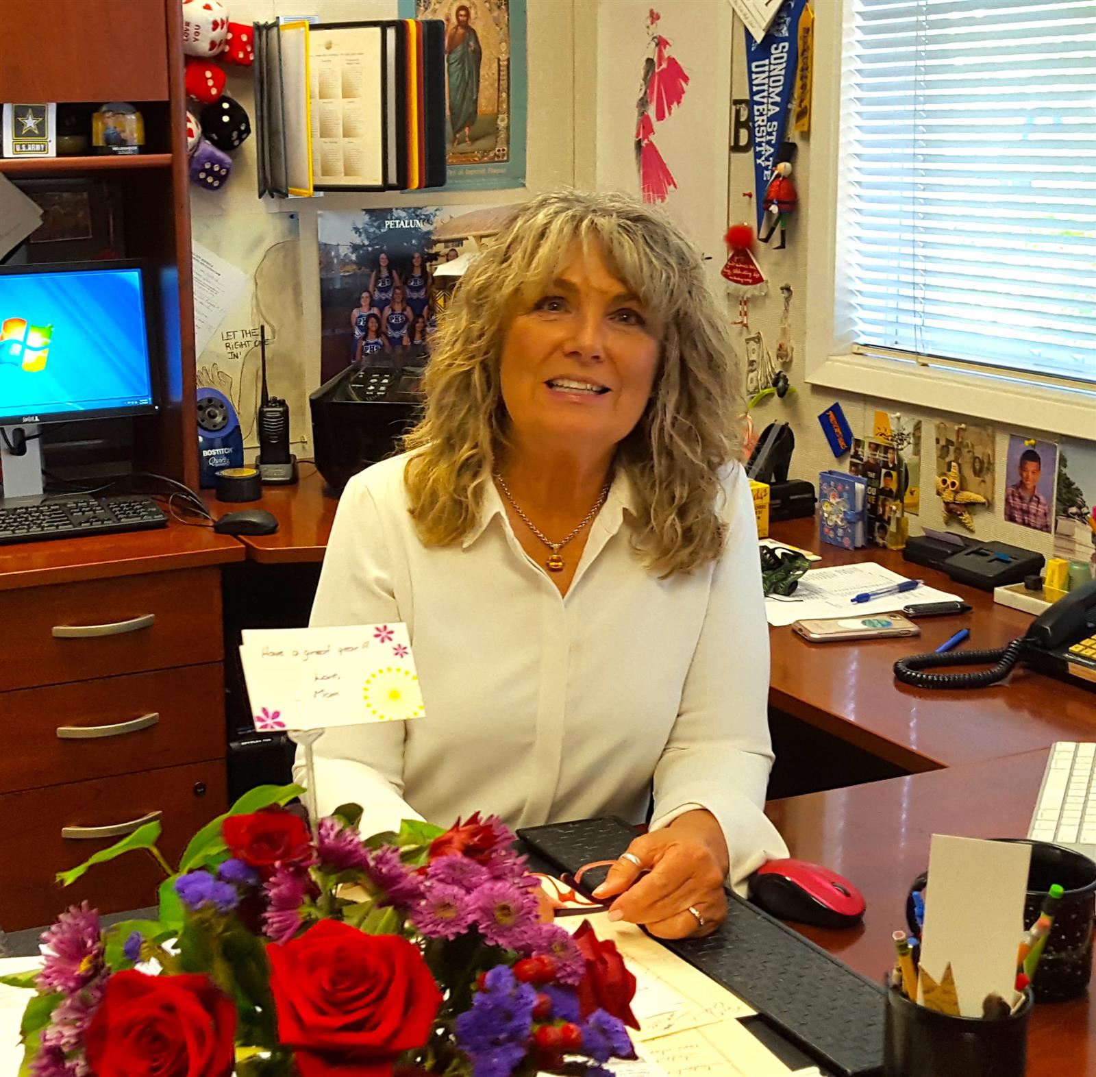  Ms. Lofton at her desk