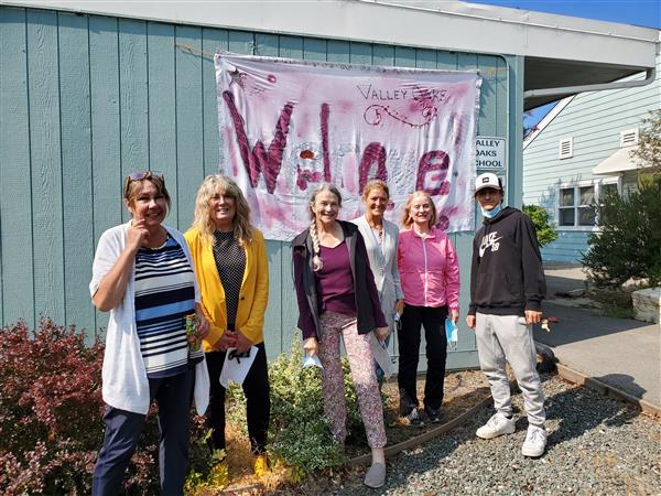 staff out in front of school