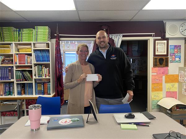 Nora Parker with PCS Superintendent, Mr. Matthew Harris - 20yr Pin